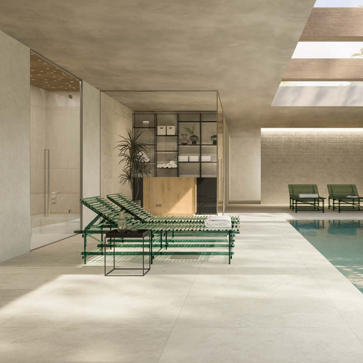 This modern indoor pool area features green lounge chairs, a small side table, glass walls, potted plant, open ceiling skylights, and shelving with towels and décor in the background. The space is filled with natural light and showcases Boost Icor - Bone flooring.