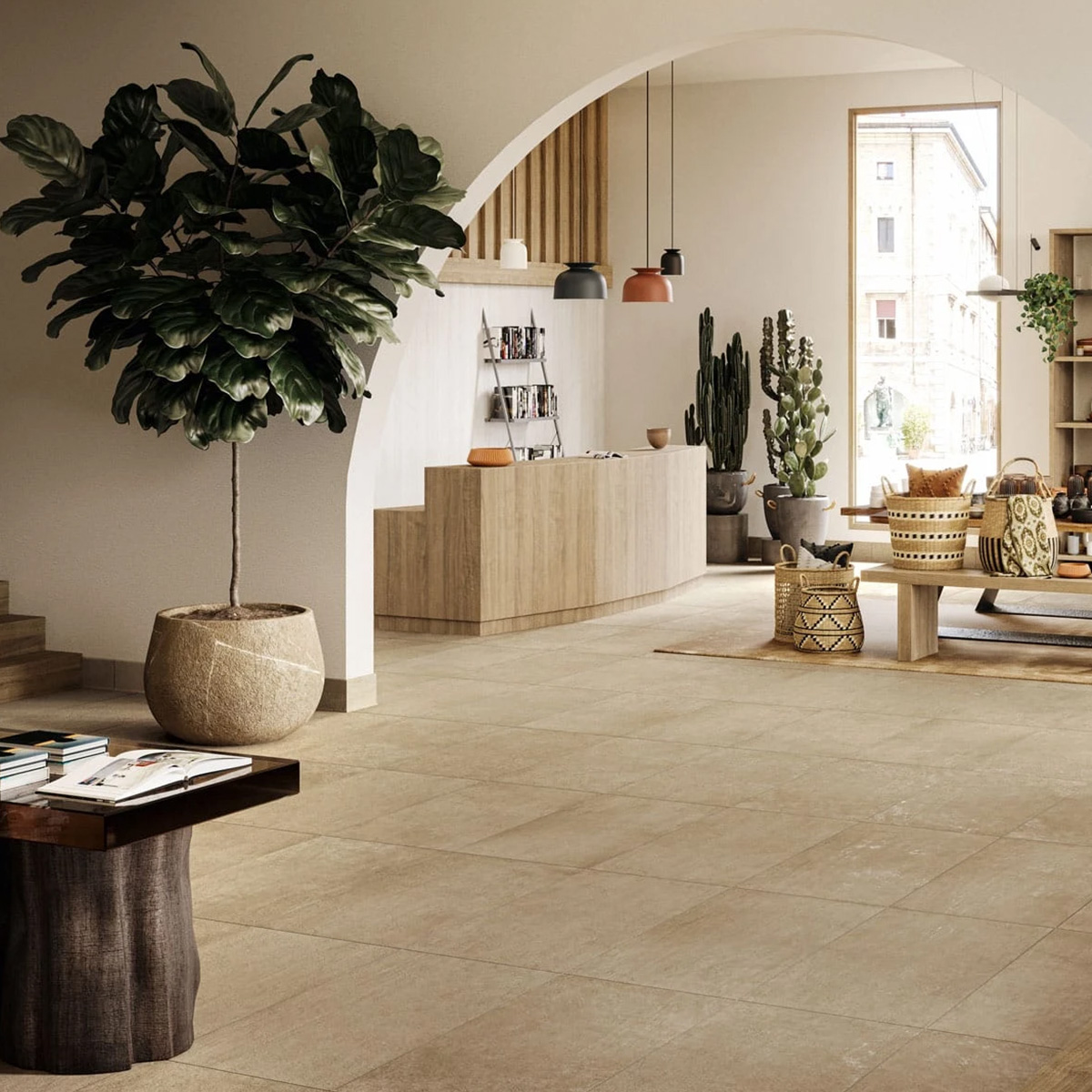 Experience a modern, spacious living room styled with Boho - Earth: beige tile floors, warm wood furniture, a large potted plant and cacti, an elegant arched doorway, chic pendant lights, and cozy decor. Sunlight pours through a tall window, filling the space with warmth and inviting charm.
