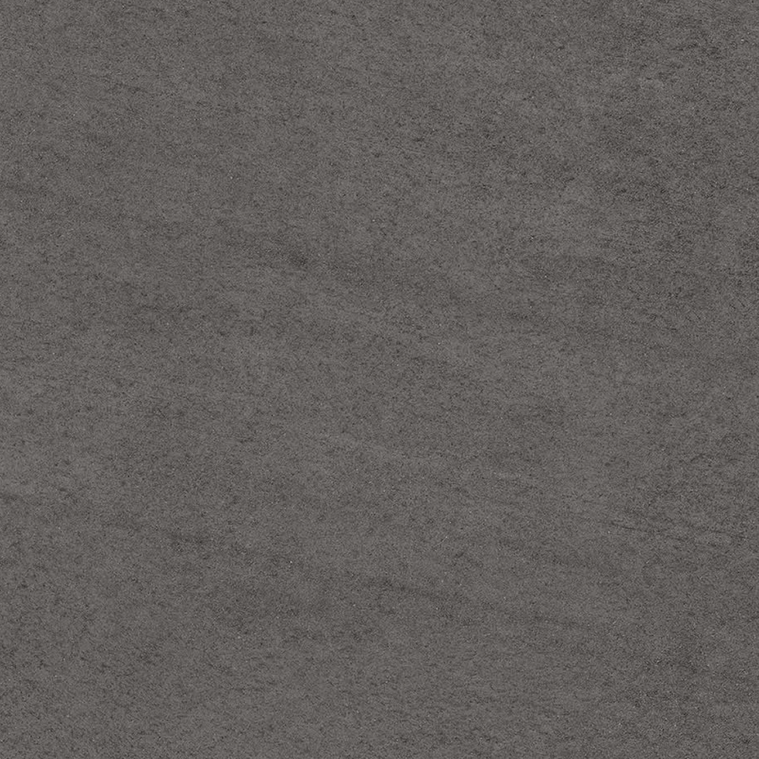 A close-up view of Basaltina Volcano, showcasing its textured dark gray stone surface with subtle variations in shading and fine, natural patterns.