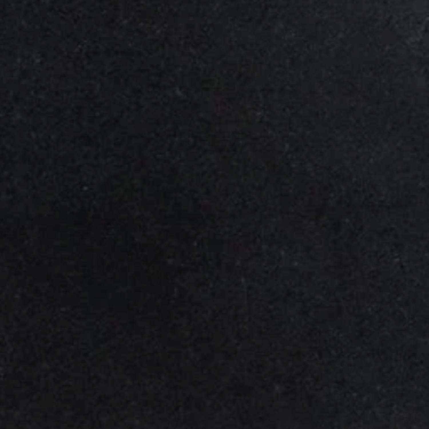 A close-up of the Bath Accessories (Corner Shelf) in black, showcasing its subtle textured surface and variations in shading.