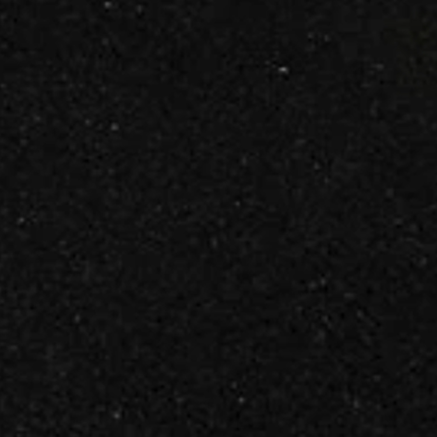 A close-up of the Bench - Black, showcasing its slightly textured black surface with small specks that resemble asphalt or rough stone.
