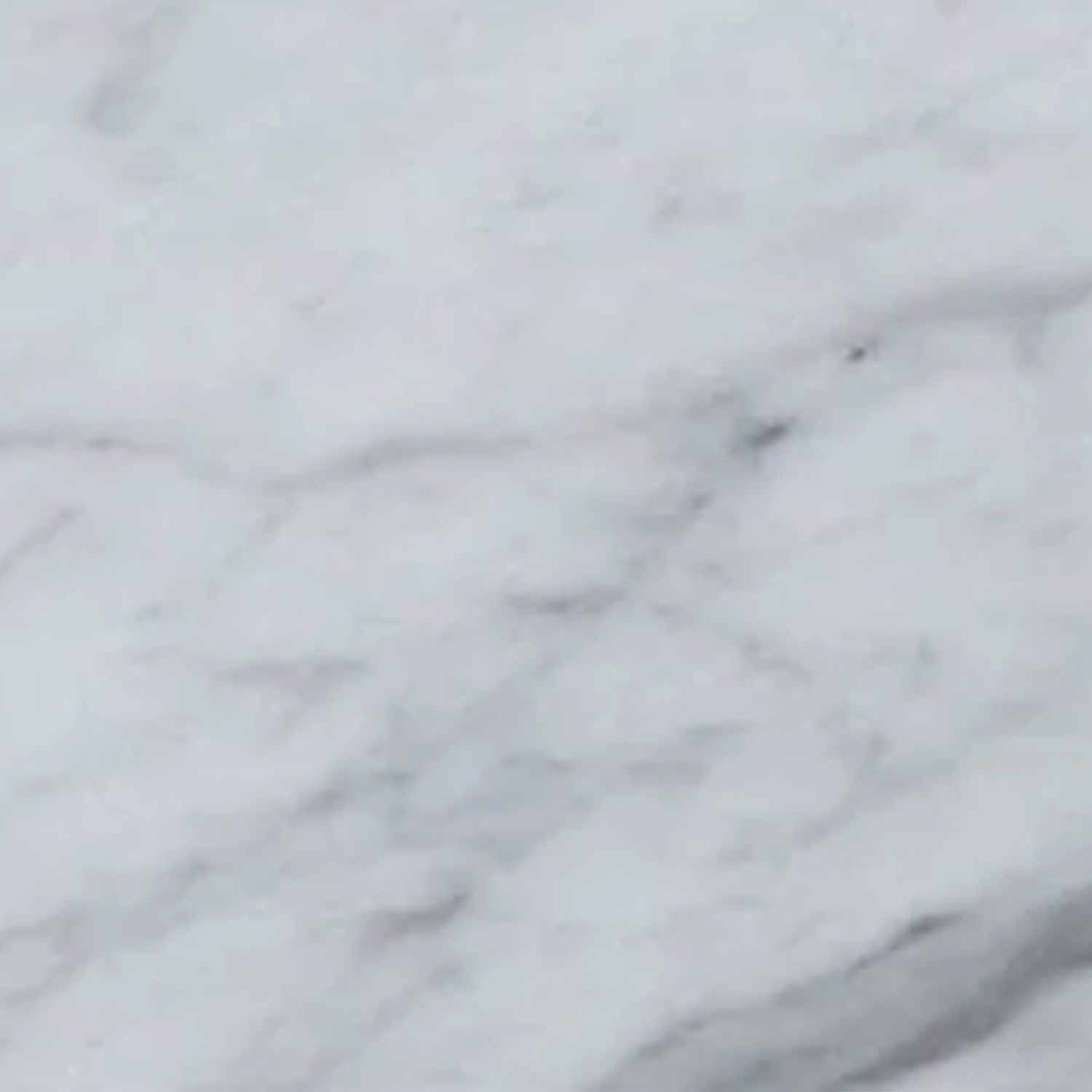 Close-up of the Bench - Colorado Calacatta surface, featuring light gray and white marble tones with natural veining and subtle texture.