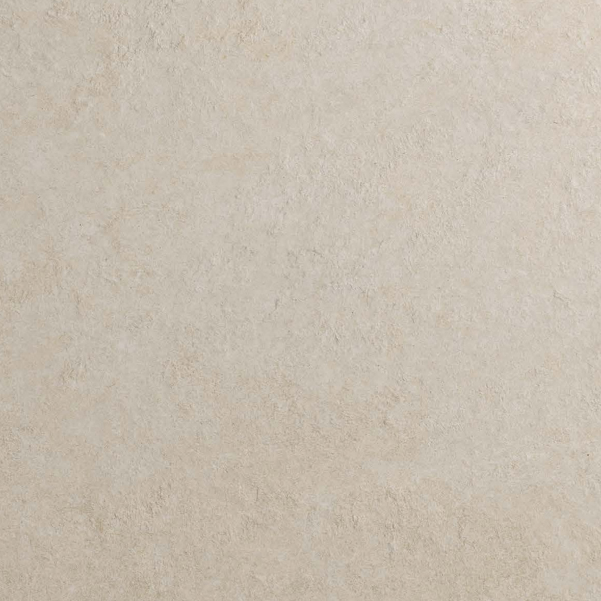 A close-up view of the Boost Mineral - White surface, showcasing its textured beige appearance with subtle variations in color and roughness reminiscent of stone or plaster.