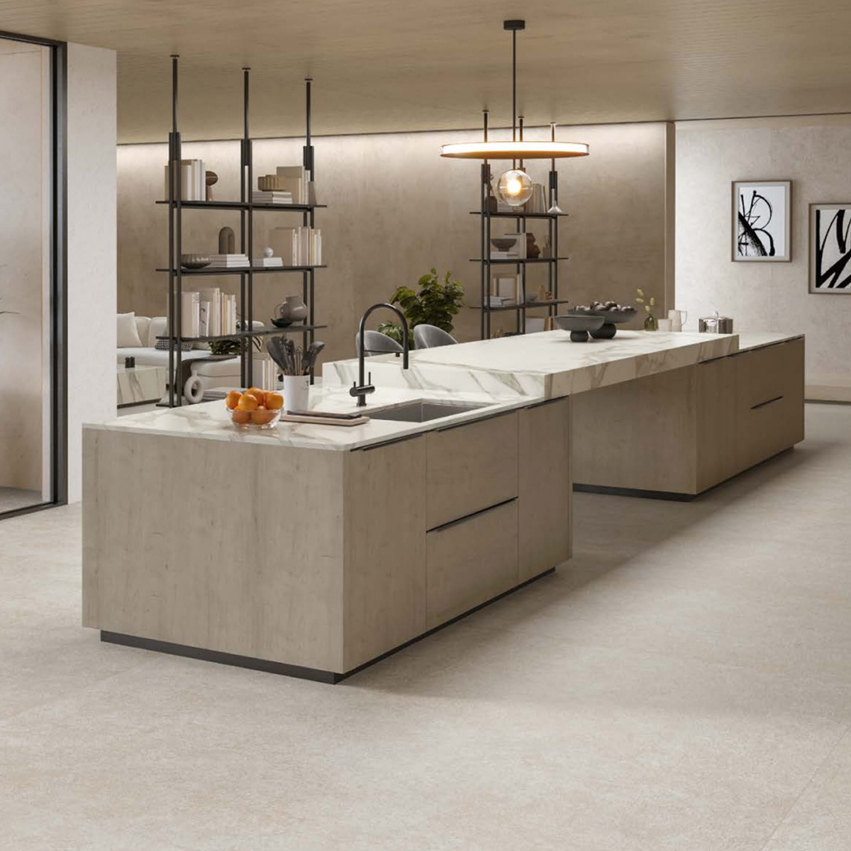 Modern kitchen featuring light wood cabinets and a long Boost Mineral - White island, paired with black fixtures and minimal decor. Open shelves provide separation between the kitchen and living area, while neutral tones and contemporary lighting enhance the sleek, airy ambiance.