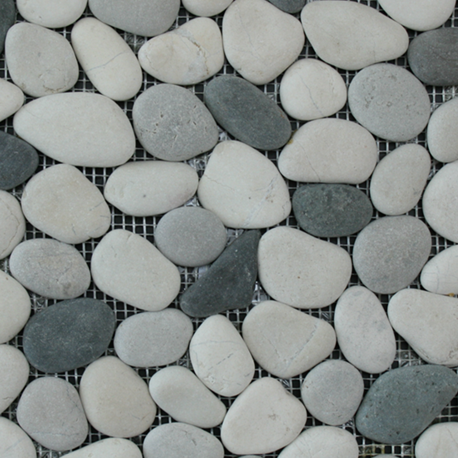 A close-up of Botany Bay - Shadow Blend, featuring smooth, oval-shaped stones in white, gray, and dark gray tones arranged in a grid pattern on a mesh background.
