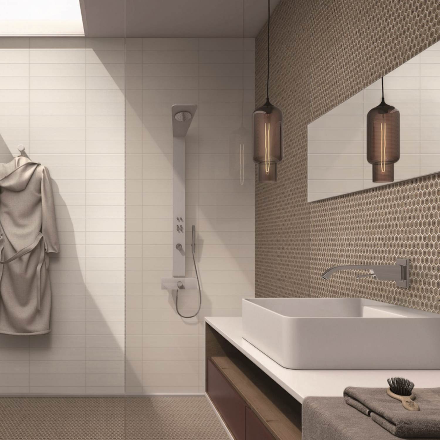 A modern bathroom featuring Chameleon - Rustic Sunset textured brown wall tiles, with a robe hanging on a hook, a walk-in shower, large sink, two pendant lights, and a mirror. A brush and towel rest on the counter.