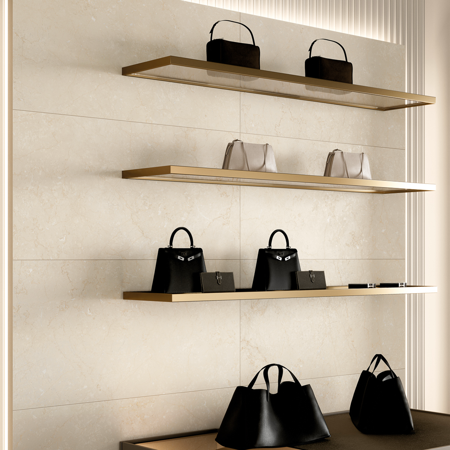 Three gold shelves display beige and black handbags against a Botticino Beige tiled wall from the Classic Boutique collection. Additional handbags sit on a lower wooden counter. The setting is elegant and minimalist.