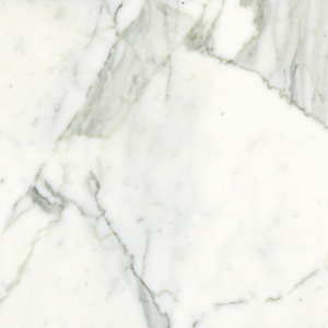 Modern bathroom featuring Classic - Statuarietto white marble walls and floor, complemented by a black countertop and fixtures, a large mirror, lush plants, a walk-in shower with glass partition, and neatly arranged toiletries.