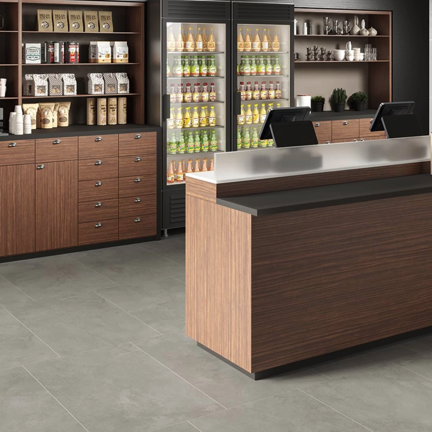 A modern cafe counter topped with Cove Terra - Gray features two registers, wood cabinets, and shelves stocked with snacks. Behind the counter are two glass refrigerators filled with bottled drinks and a shelf displaying cups and plates.