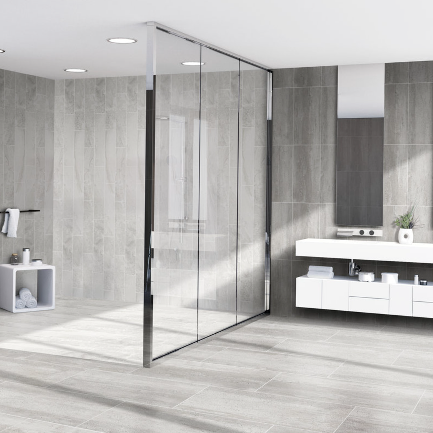 Modern bathroom featuring Ecocrete - Aqua walls, a glass shower enclosure, sleek gray tiles, a large mirror, white floating vanity with drawers, towels neatly arranged on shelves, and recessed ceiling lights.