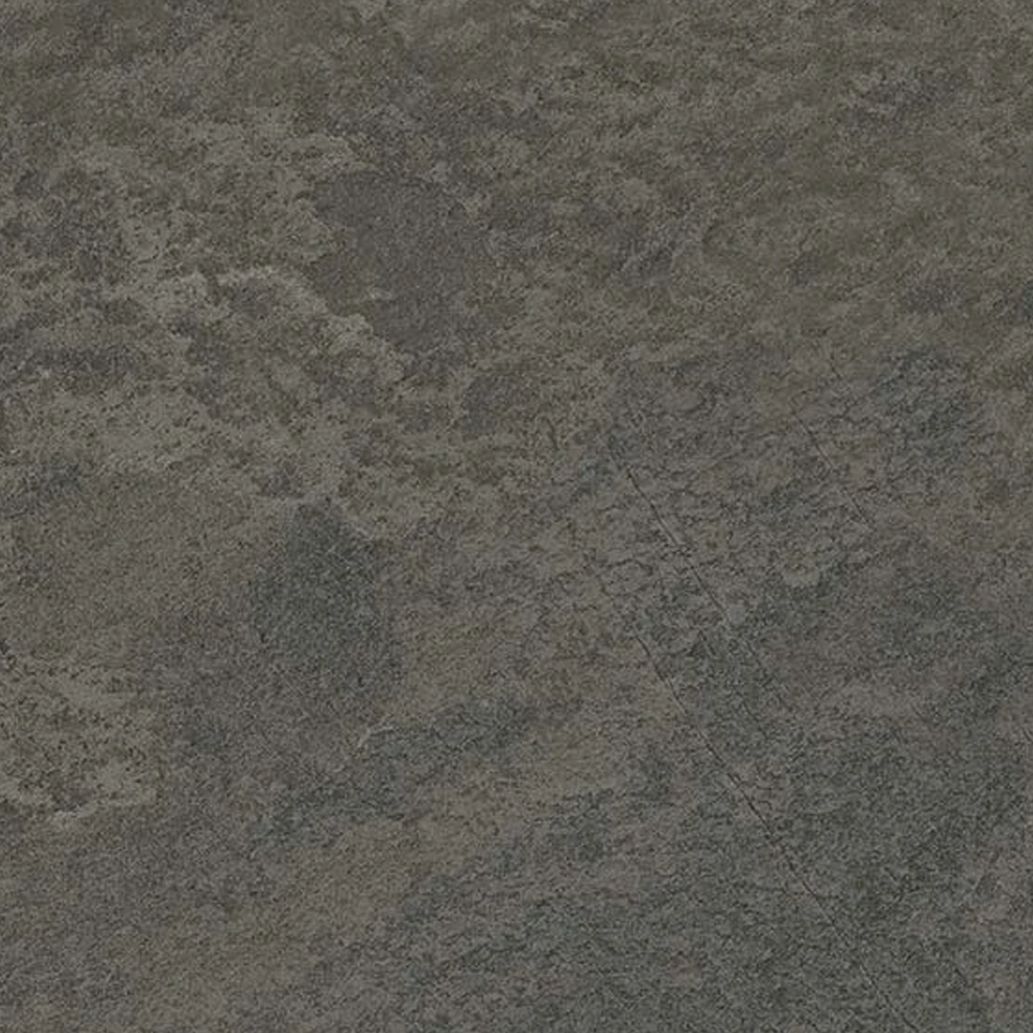 A close-up of the Element - Carbon surface reveals its textured, dark gray finish with subtle color variations and rough patterns reminiscent of natural stone or concrete.