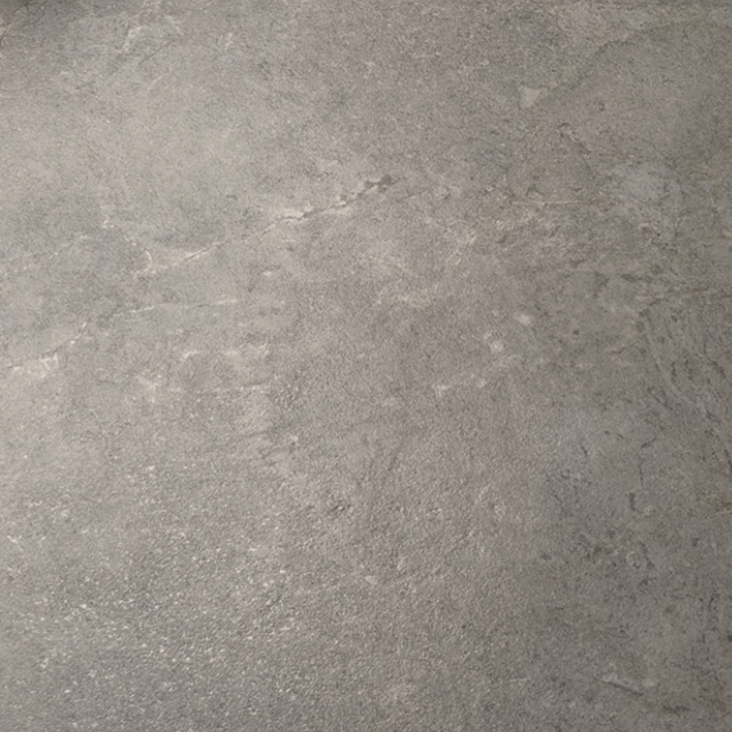 Everstone - Ever Greige features a gray textured concrete surface with subtle variations in color and pattern, presenting both light and dark areas. The finish appears slightly rough and unfinished, characteristic of cement or stone floors and walls.