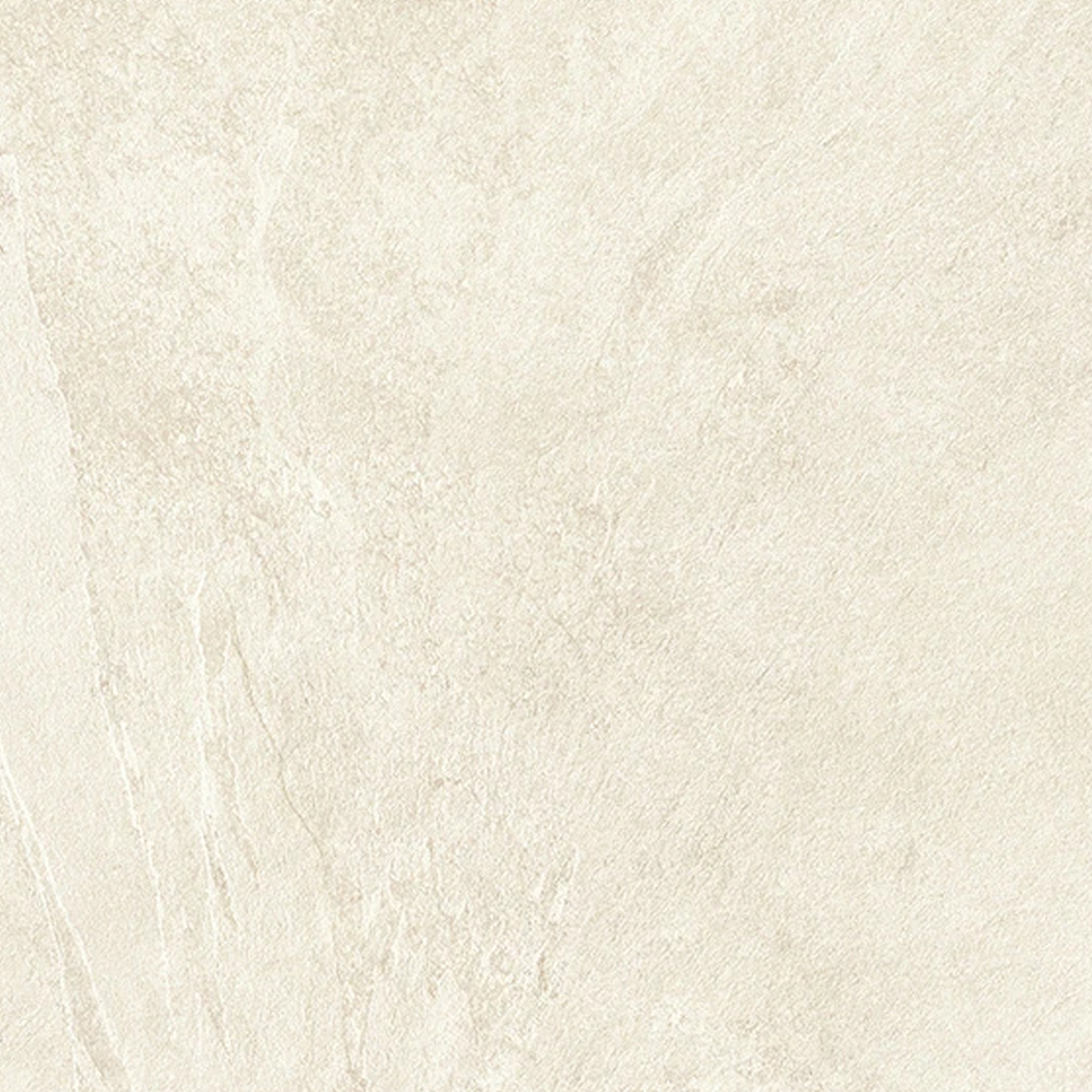 Close-up of Hero - Snow, a light beige stone surface featuring subtle veining and natural texture, creating a soft and neutral background.