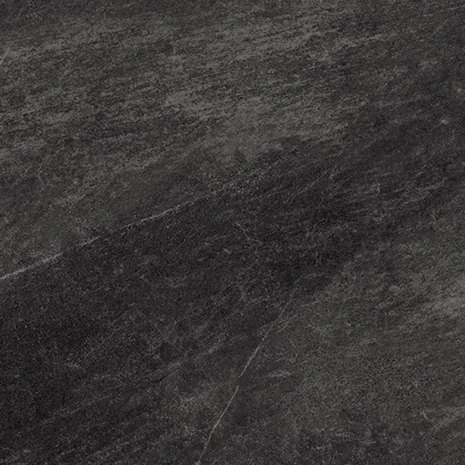 Legacy Marblestone - Black features a textured dark gray stone surface with subtle diagonal veining and variations in shading, reminiscent of slate or granite.