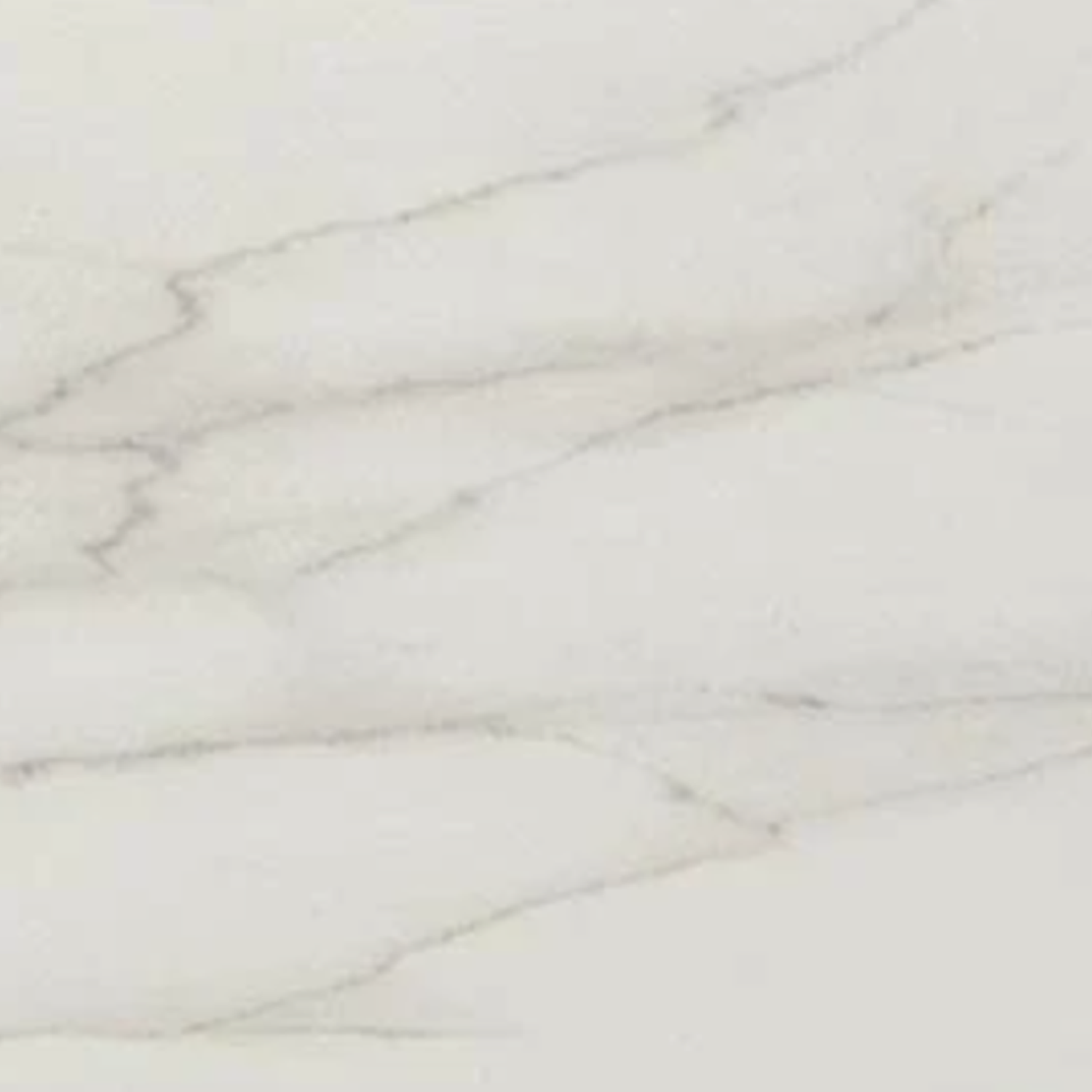 Liberty - Calacatta Centenial Wall features a white marble surface with subtle gray veining running diagonally across. Its smooth, polished texture offers a clean and elegant appearance.