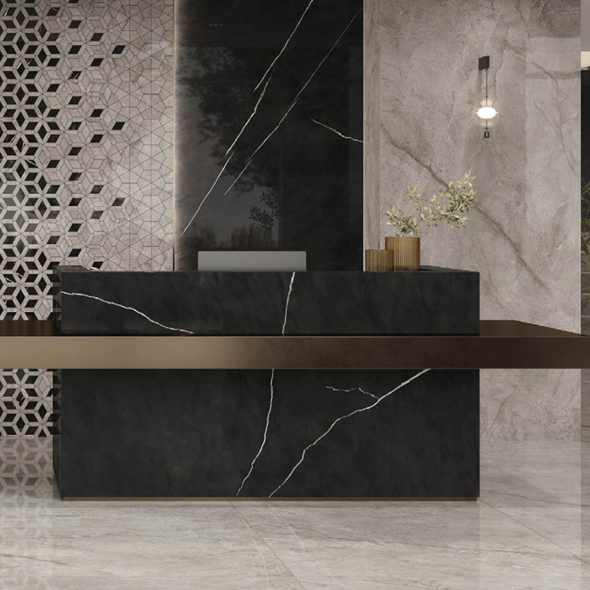 A modern reception desk featuring the Marvel Meraviglia - Black Origin marble finish, complemented by gold accents and decorative plants. The background showcases geometric and marble wall designs, highlighted by a hanging bulb light fixture.