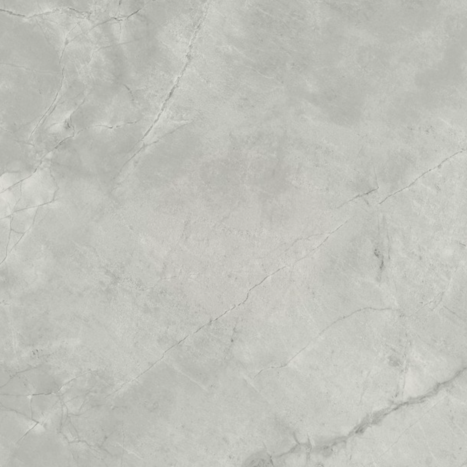 Marvel X - Grey Cloud features a light gray marble surface adorned with subtle white and darker gray veining, creating a smooth, natural stone look.
