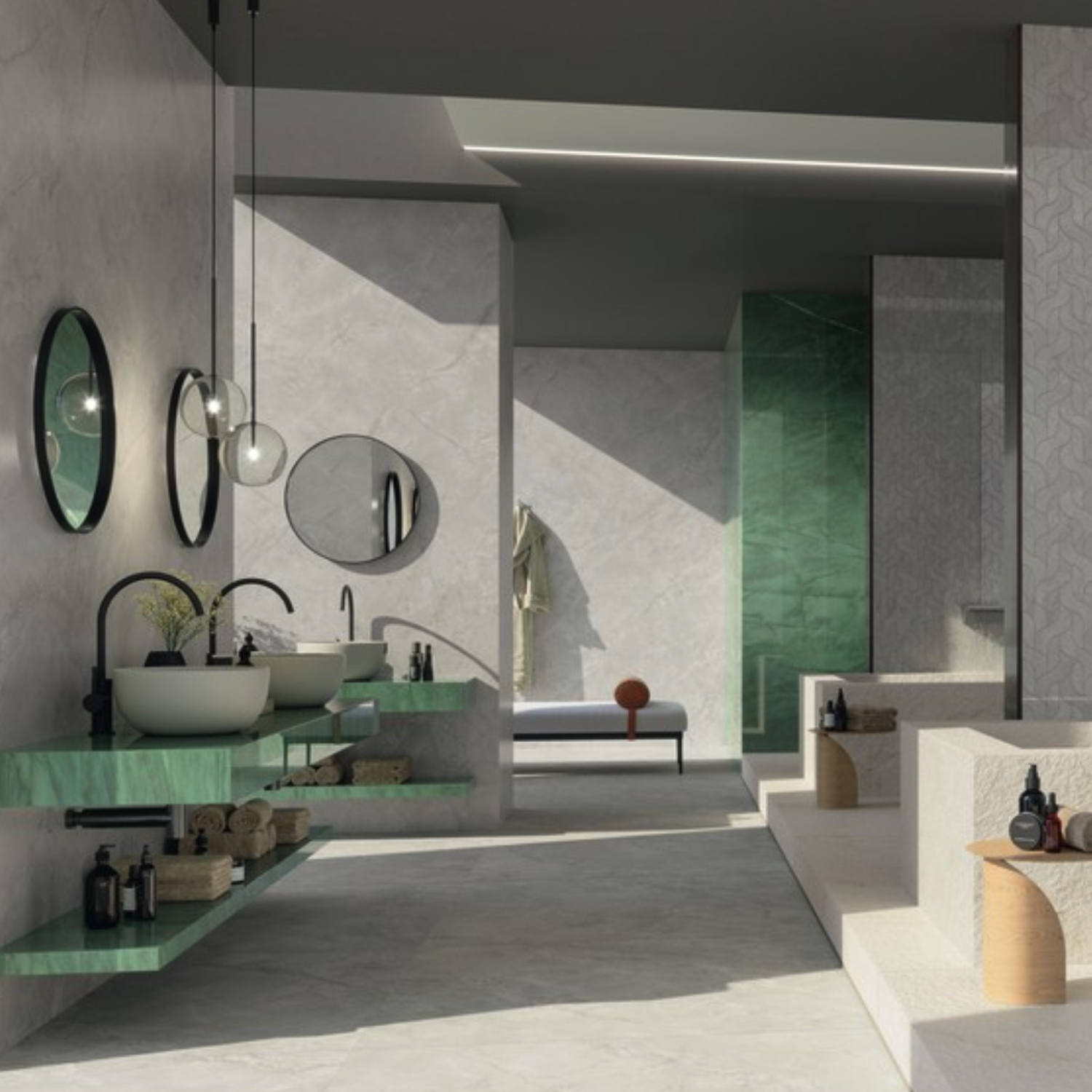 Modern bathroom featuring Marvel X - Grey Cloud marble walls, complemented by green shelving, vessel sinks, round mirrors, and sleek black fixtures. A glass shower, sunlit bench, and organized bath products complete the bright, spa-like atmosphere.