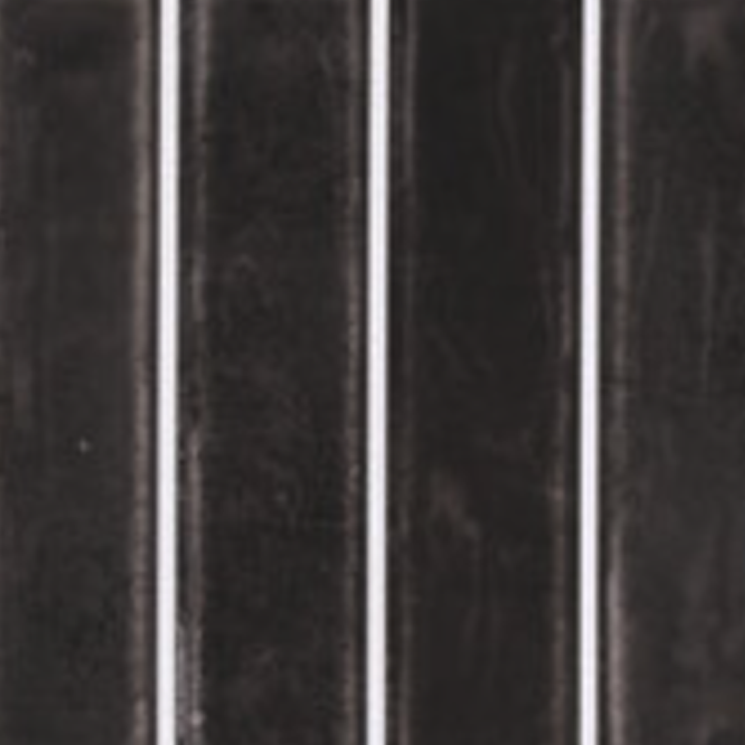 Pim Pam Pum - Pim Night features black rectangular tiles accented by three evenly spaced vertical white grout lines, resulting in a modern and sleek grid pattern.