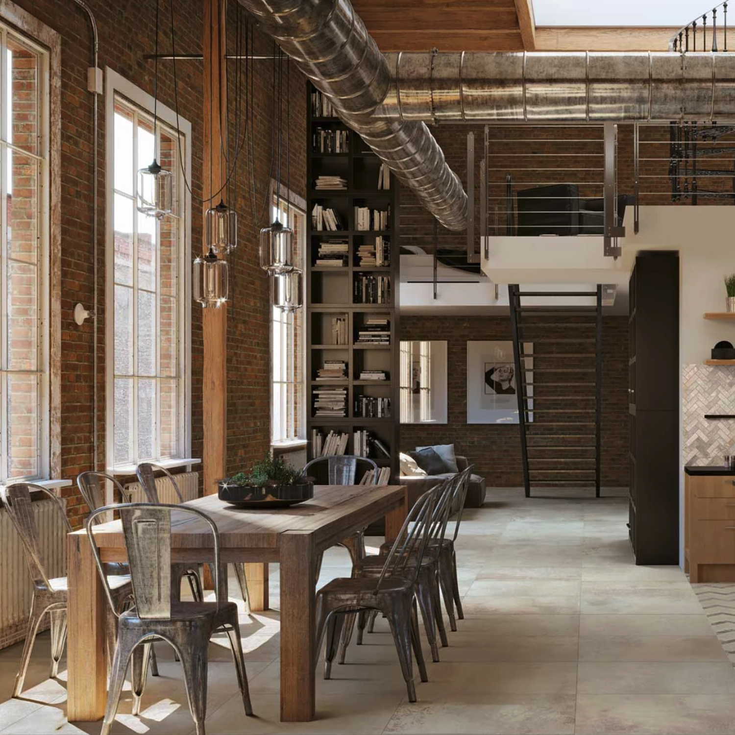 Industrial-style dining area featuring the Rift - Gravel wooden table, complemented by metal chairs, exposed brick walls, large windows, hanging pendant lights, bookshelves, and visible ductwork, with a loft and ladder in the background.
