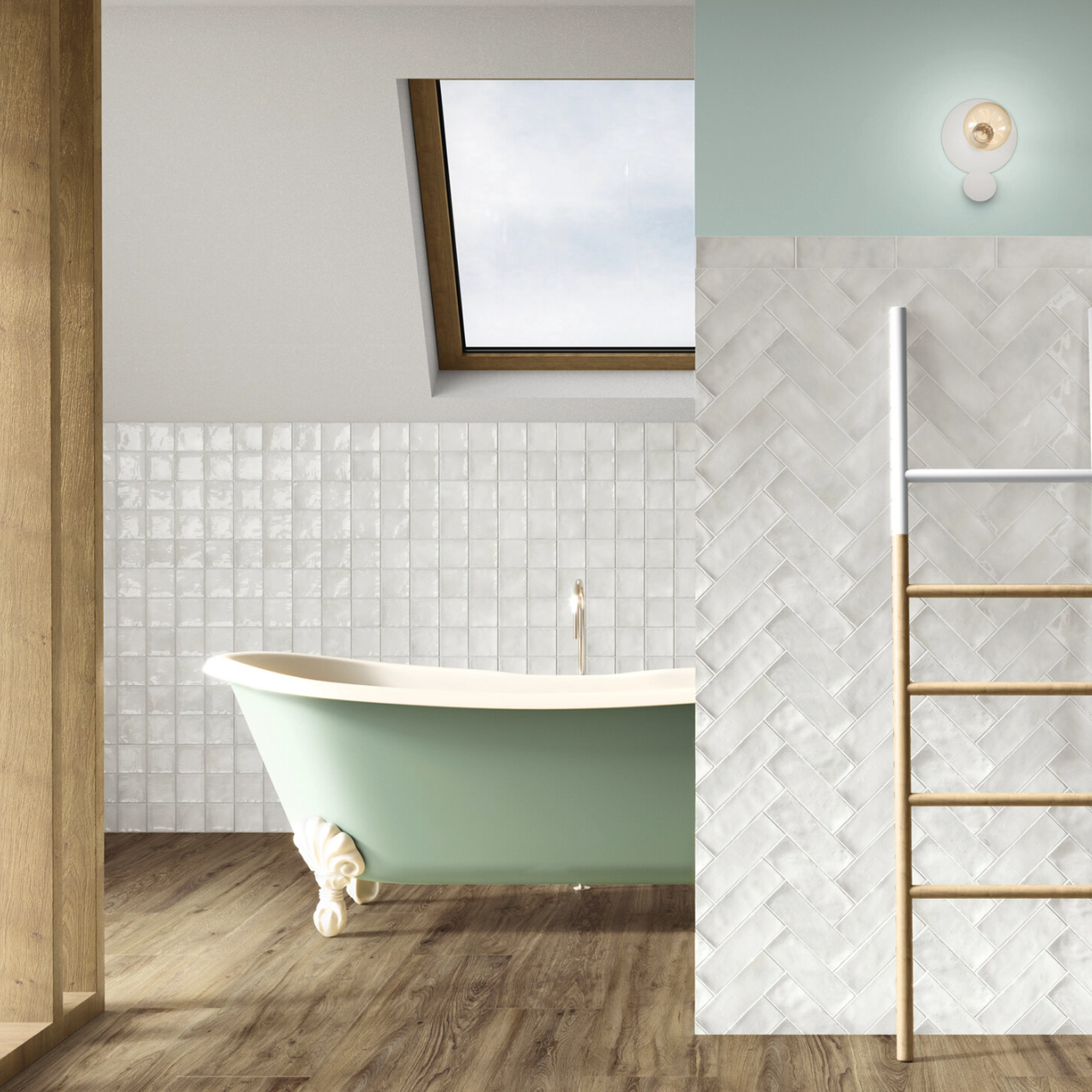 A Seville - Snow clawfoot bathtub in light green sits on wood flooring under a skylight in a bright bathroom with white tiled walls and a wooden ladder shelf.
