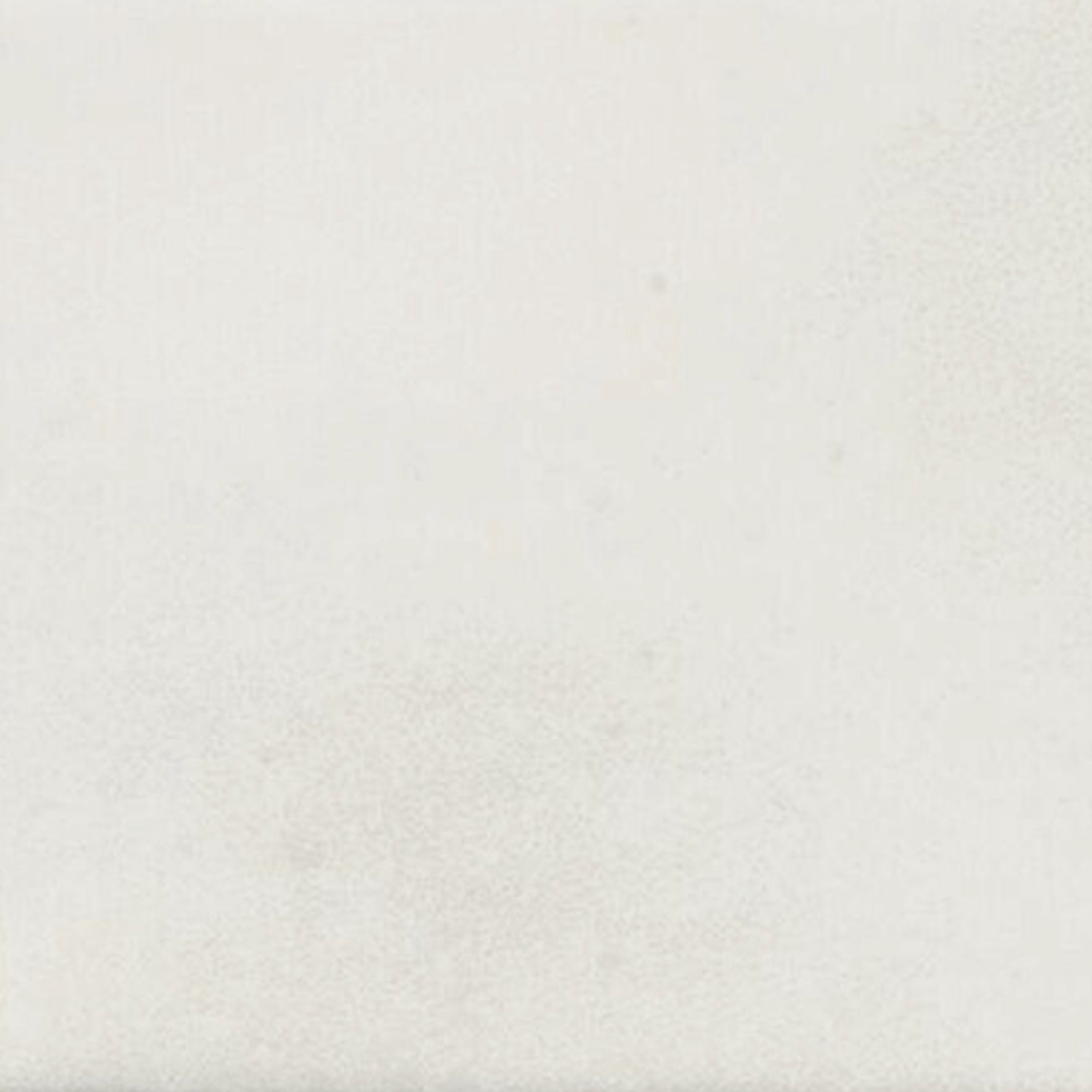 A slightly textured, off-white surface characteristic of Seville - Snow fills the image, with subtle shading variations adding a natural, uneven look.