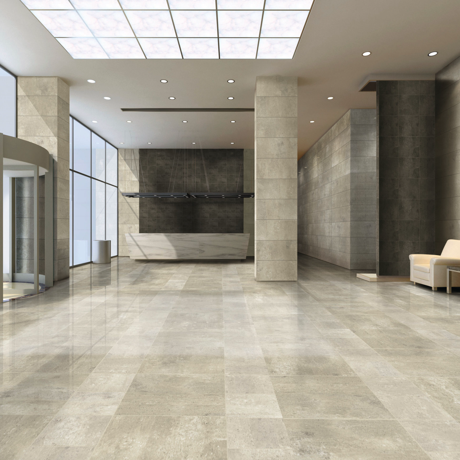 Modern office lobby with large beige tile floors, tall pillars, a marble reception desk, glass walls, and a few Simply Modern - Creme chairs. The ceiling features recessed lights and a large, bright skylight panel.