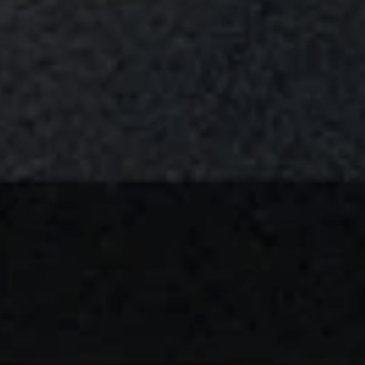 A close-up image of Thresholds - Black shows two horizontal sections: a dark gray, slightly textured area on top and a deep black area on the bottom.