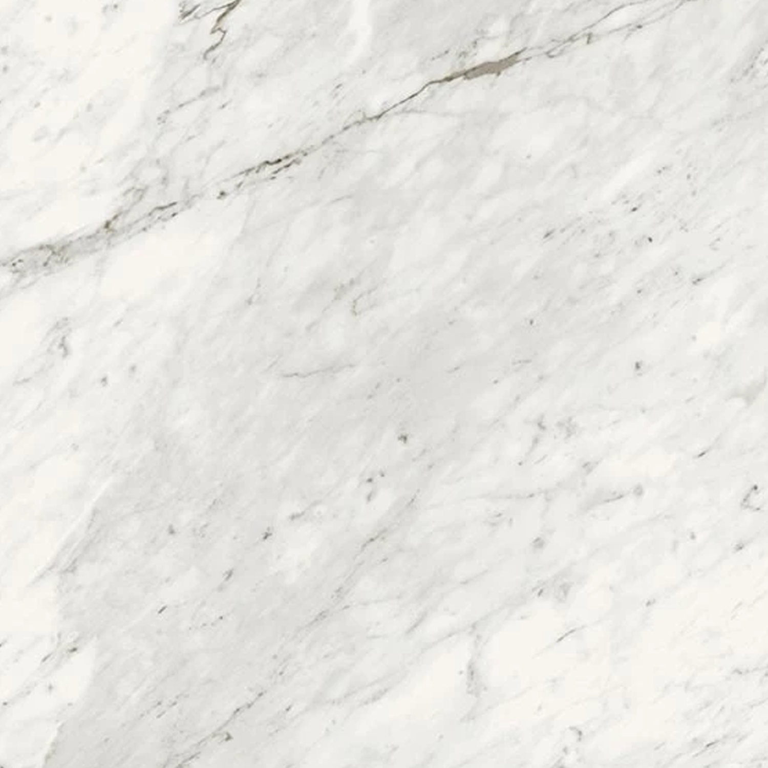 Trilogy - Carrara Classic features a white marble surface with soft gray and subtle darker gray veining that runs diagonally, resulting in a natural, elegant look with a smooth, polished finish.