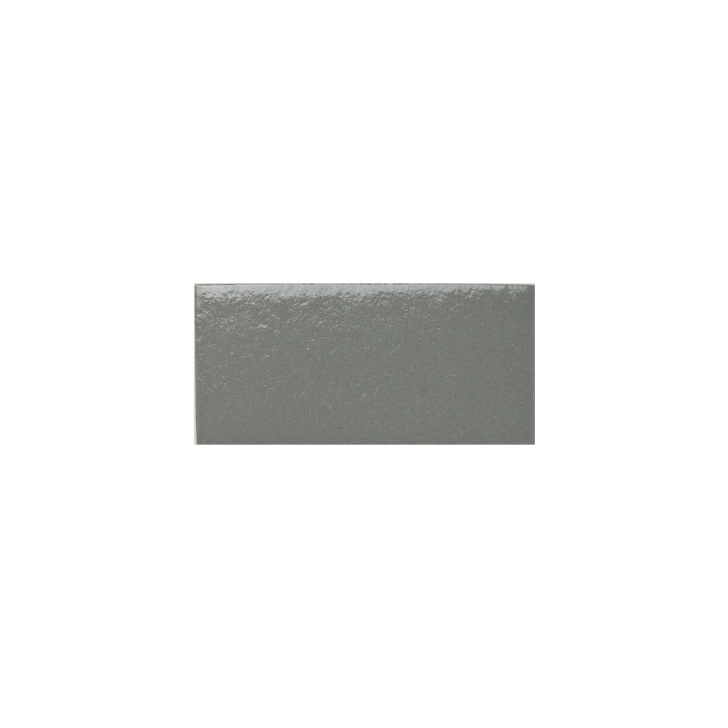 A single rectangular Arka - Arka Steel ceramic tile in gray, featuring a slightly textured, glossy surface, centered on a plain white background.