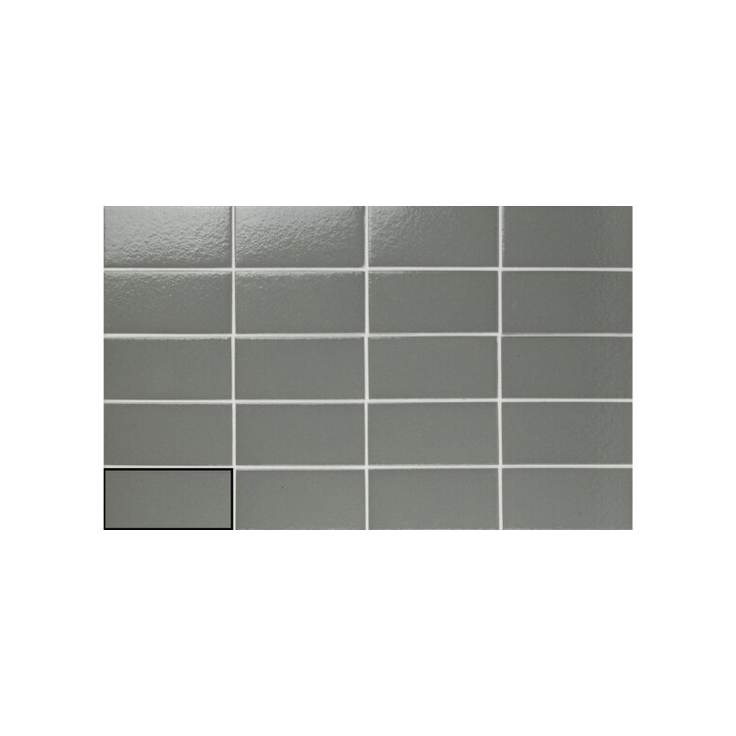 Arka - Arka Steel rectangular gray tiles are arranged in a grid with white grout lines, set against a plain white background. One tile in the bottom left corner is outlined in black, highlighting it among the others.