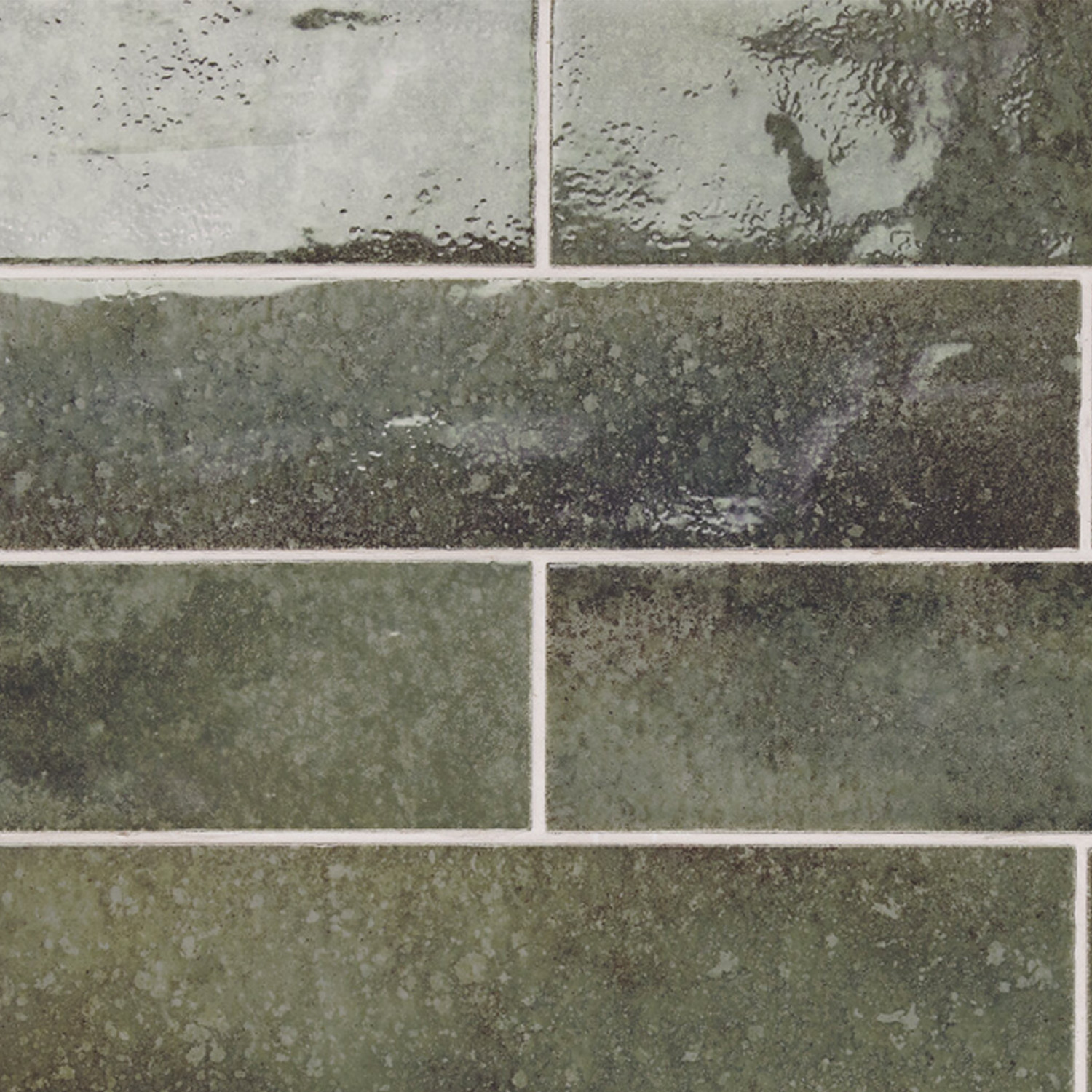 Touch - Green tiles are glossy green rectangles installed in a staggered brick pattern, featuring visible grout lines and subtle texture variations on every tile.