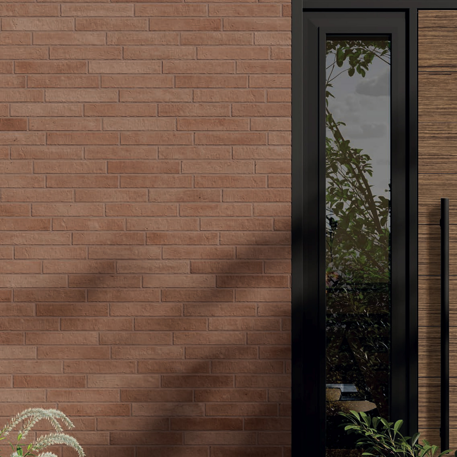 A Tyrrhenia - Clay brick wall with a narrow, tall window on the right side, framed in black. Plants and greenery are visible through the window, and some plant shadows are cast on the Tyrrhenia - Clay brick wall.