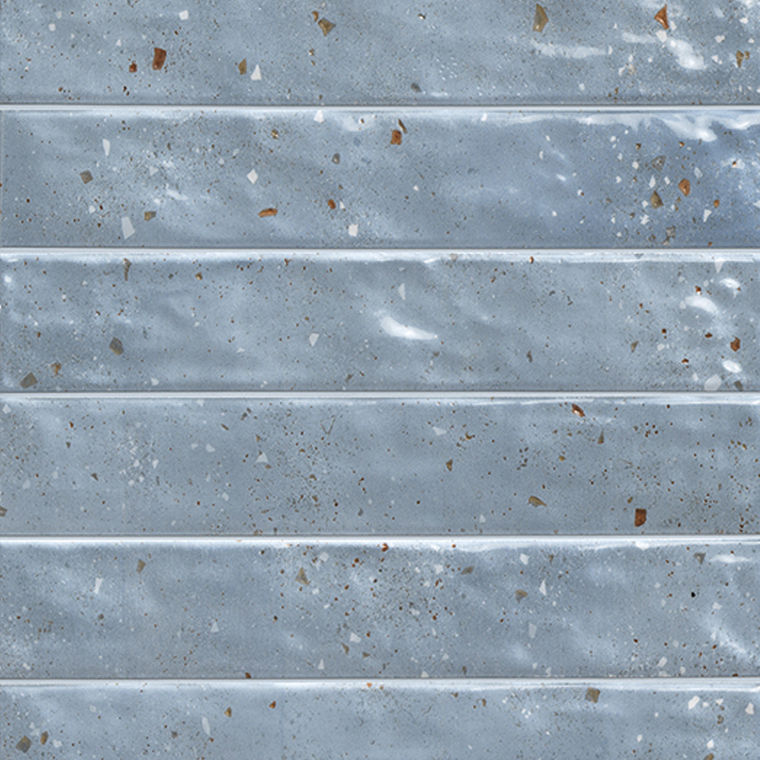 Via Del Sale - Sky tiles feature a light blue rectangular shape with a glossy finish, arranged in horizontal rows. Subtle speckles of brown and white are scattered across each tile, giving them a textured and weathered look.