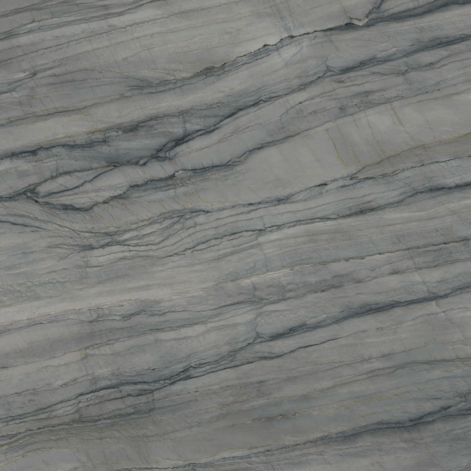 Grey Storm features a marble surface with intricate, wavy veins in multiple shades of gray and subtle hints of gold, creating a natural, layered stone pattern.